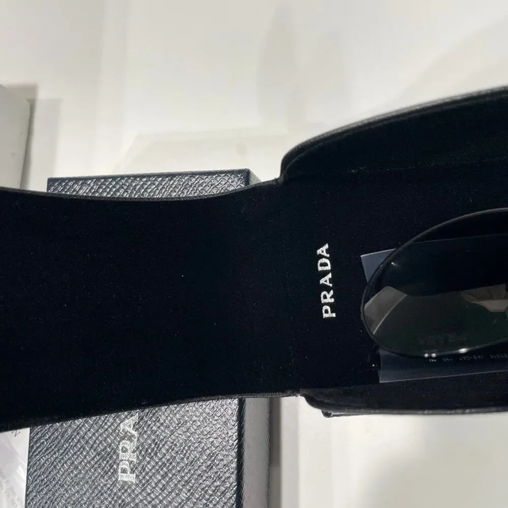 Prada 61mm Oval Sunglasses silver
